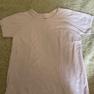 Athleta Girl size large or 12. Light pink cute for running for girls.